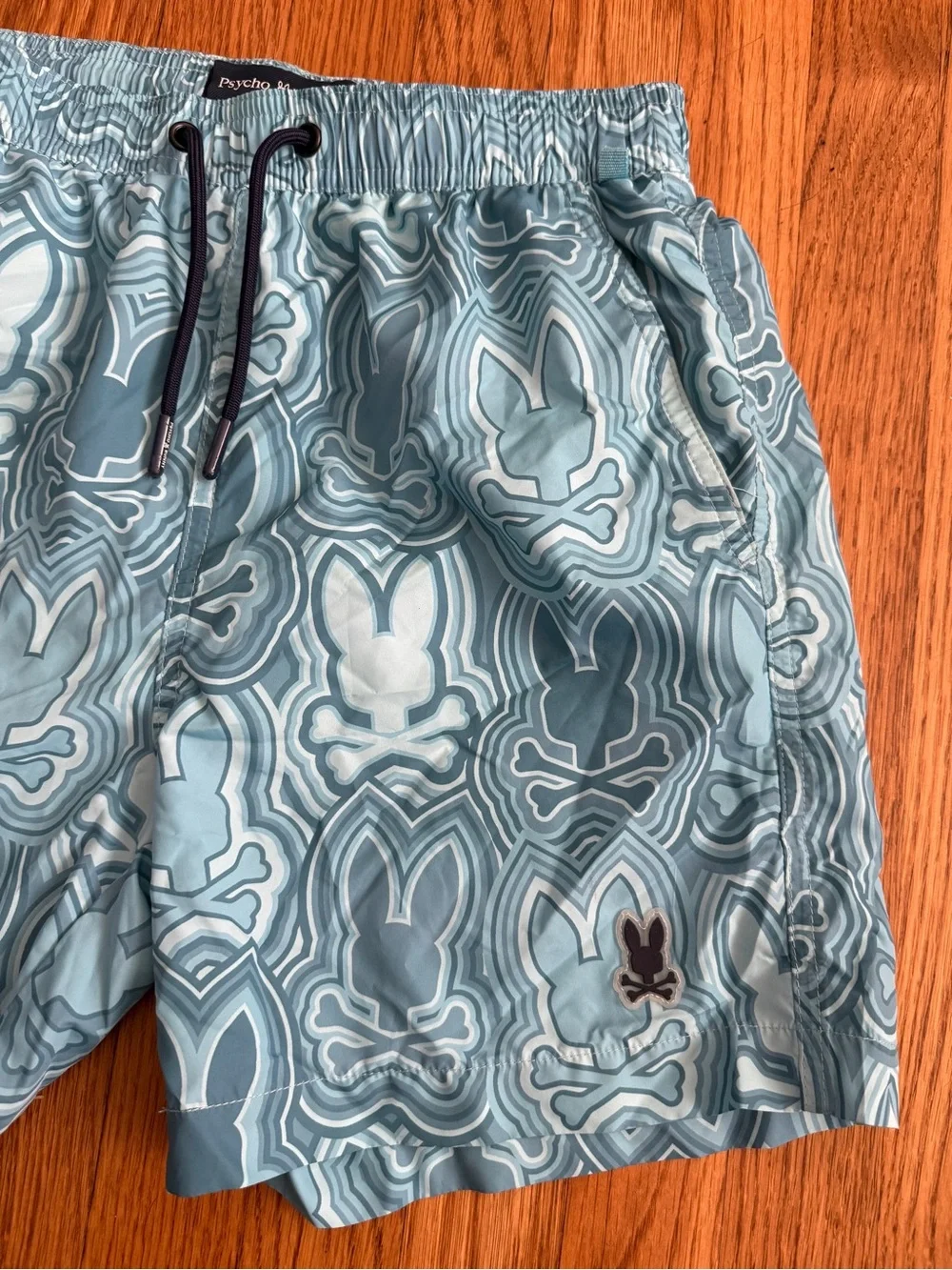 Psycho Bunny blue bunny logo beach swim trunks L 14/16
